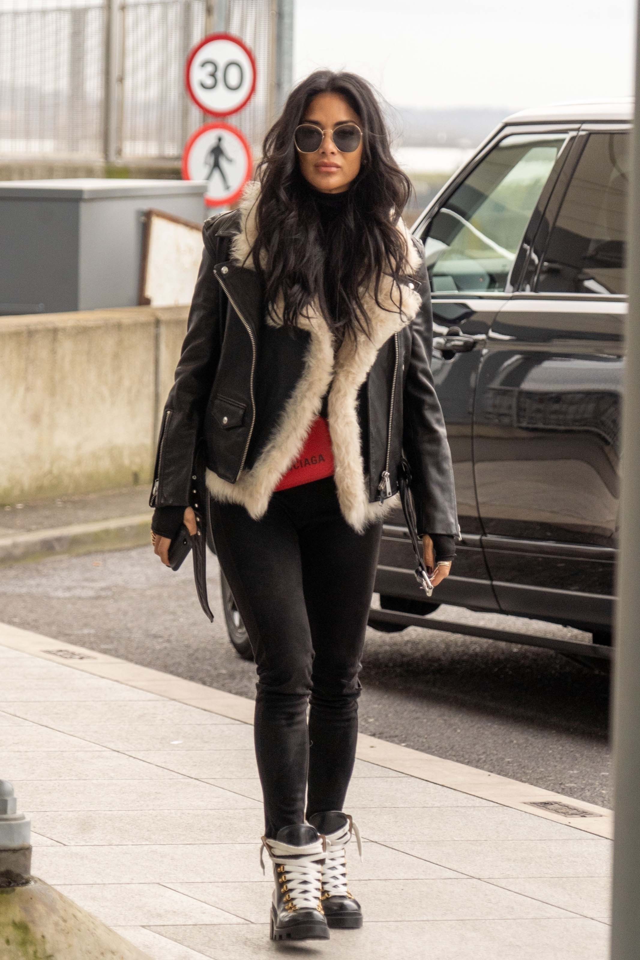 Nicole Scherzinger at Heathrow Airport