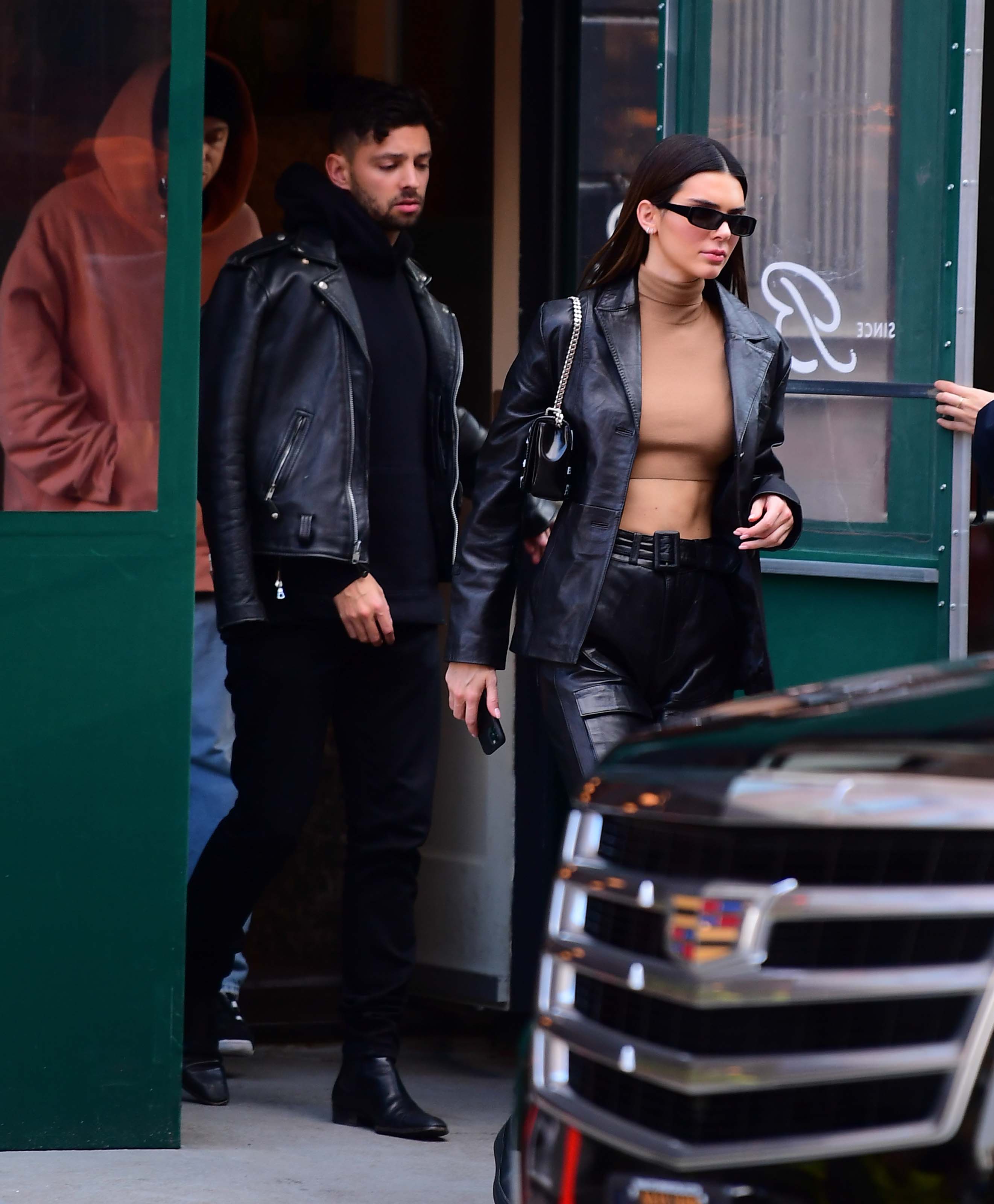 Kendall Jenner flashes her toned abs