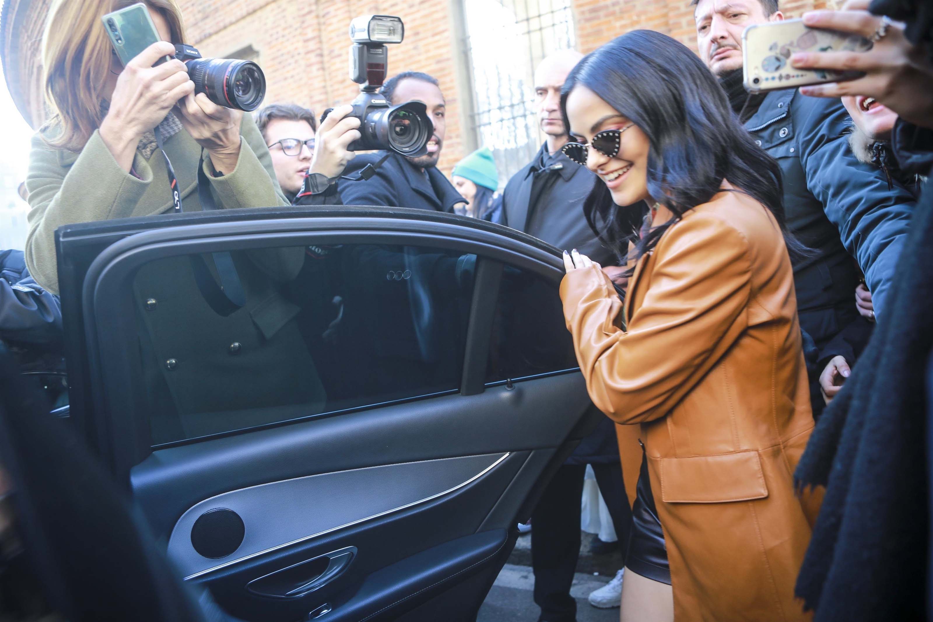 Camila Mendes arrives at the Salvatore Ferragamo Fashion Show