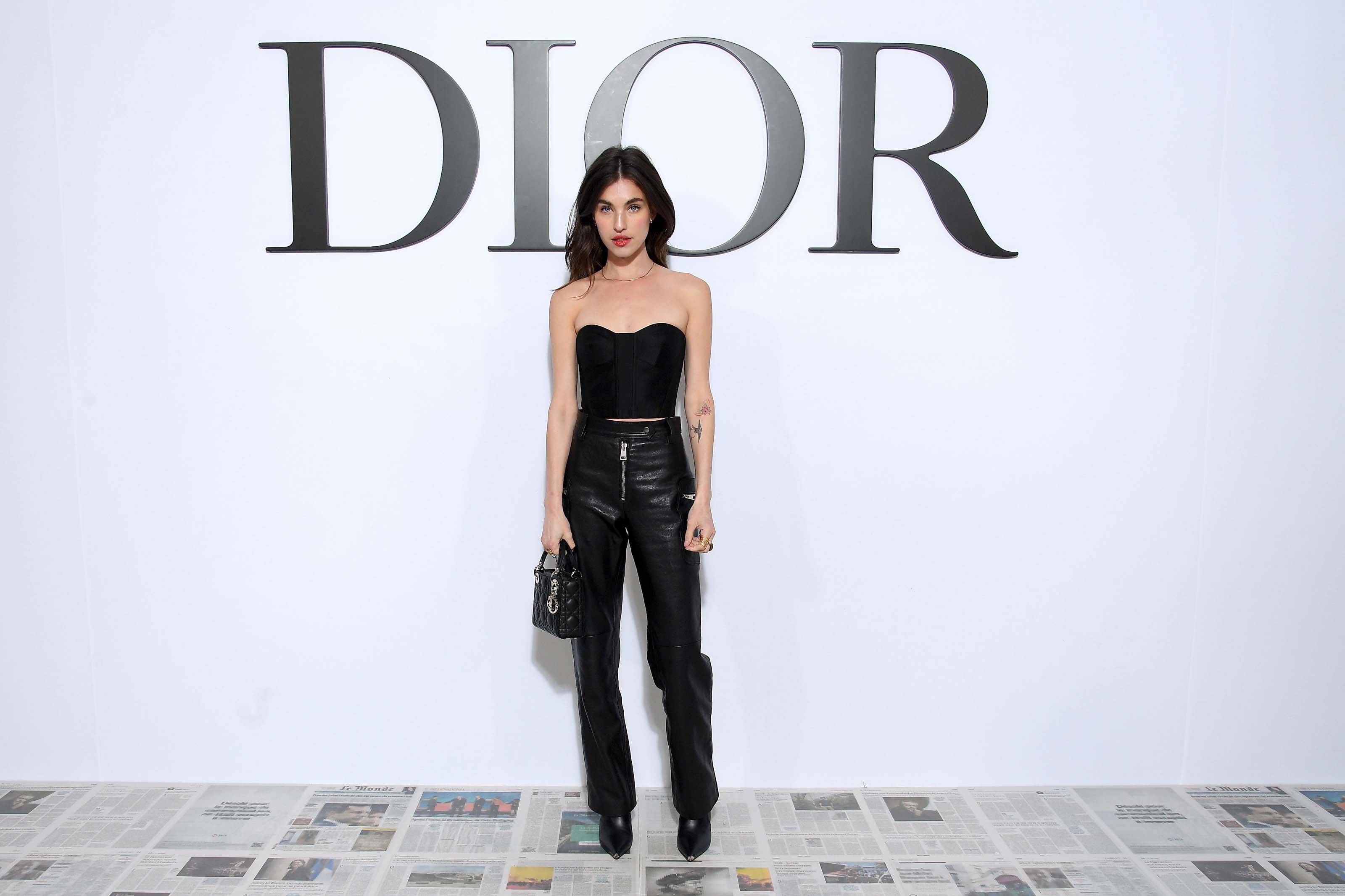 Rainey Qualley attends Dior show