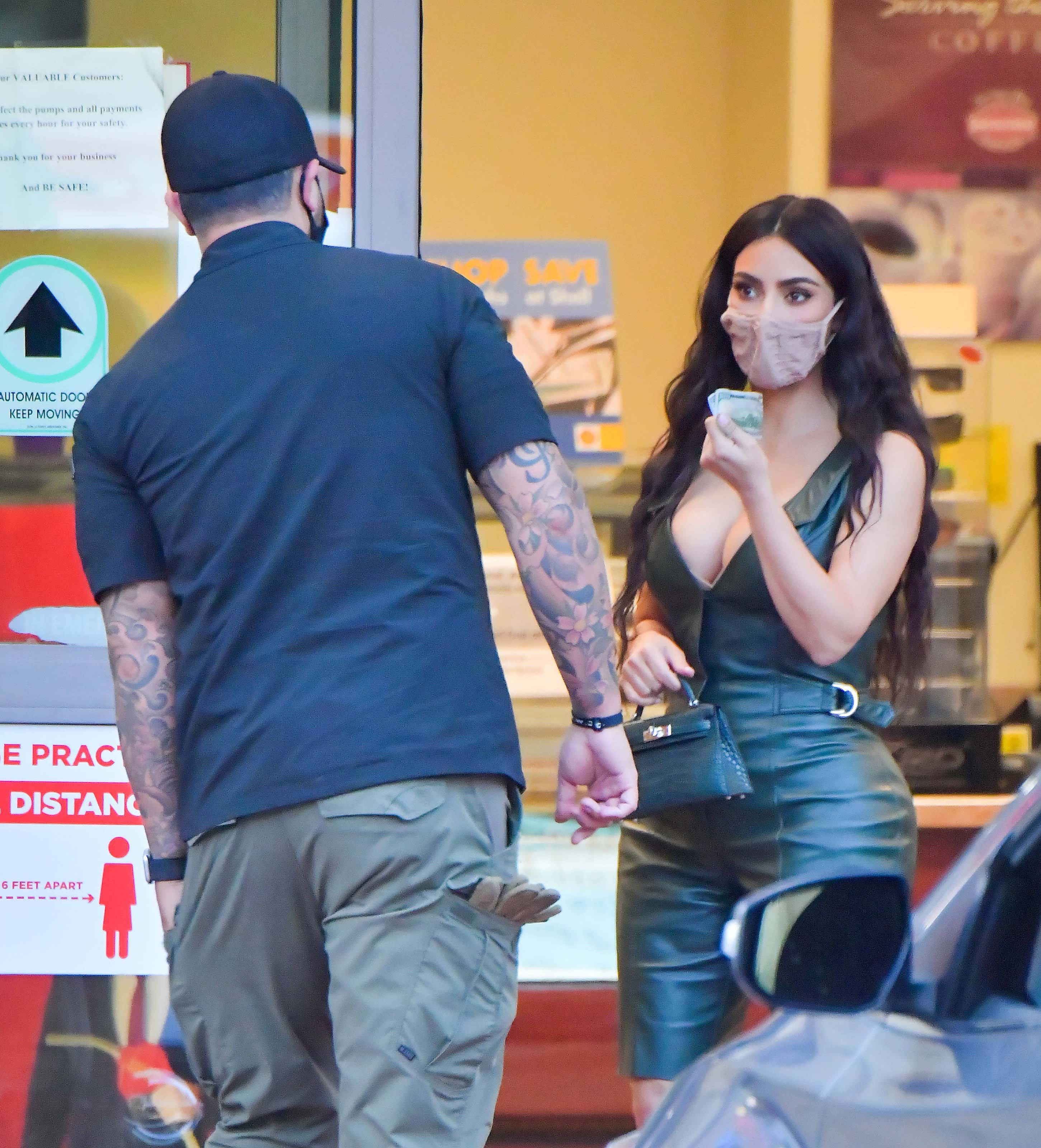 Kim Kardashian wears a mask as she’s seen in LA