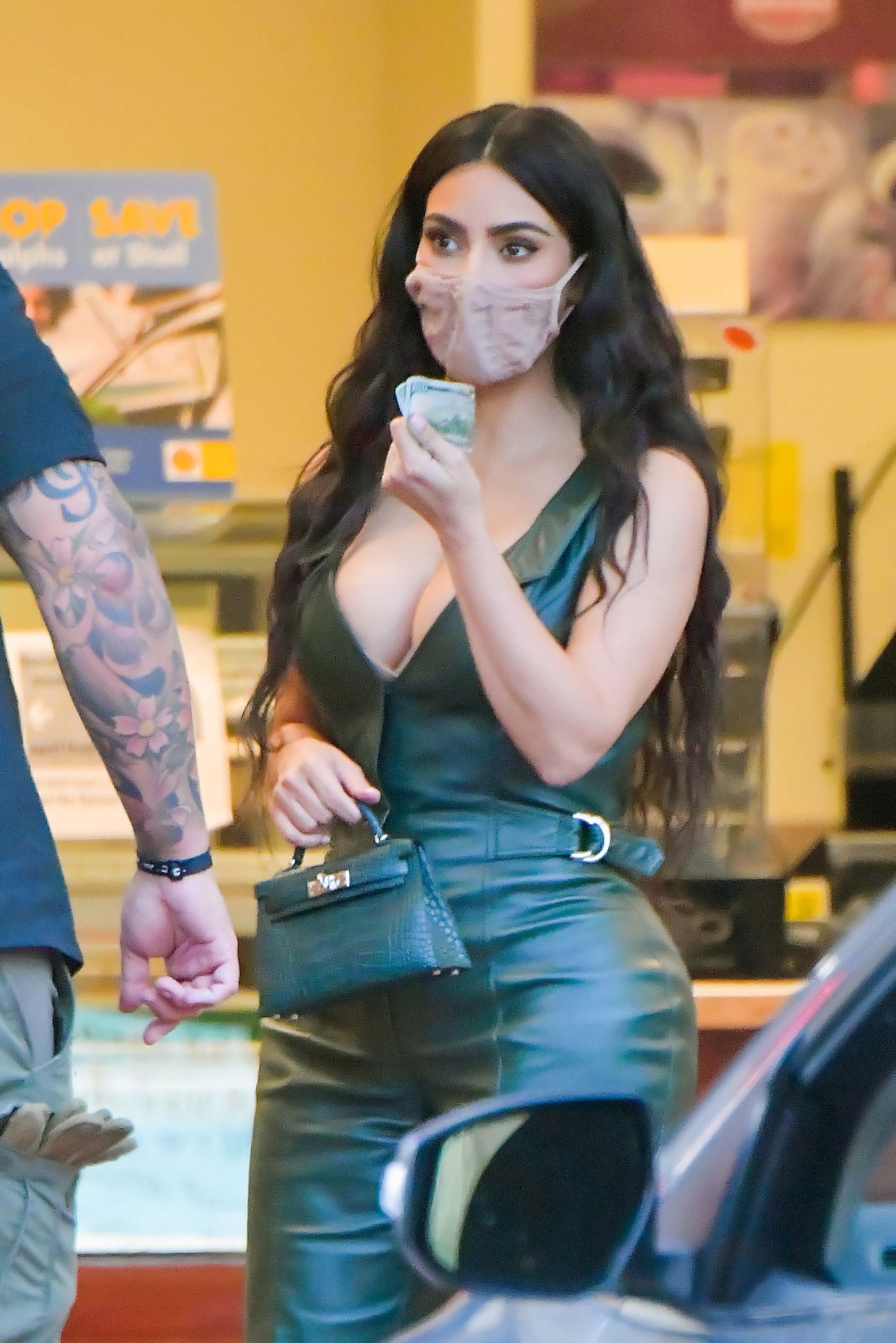 Kim Kardashian wears a mask as she’s seen in LA