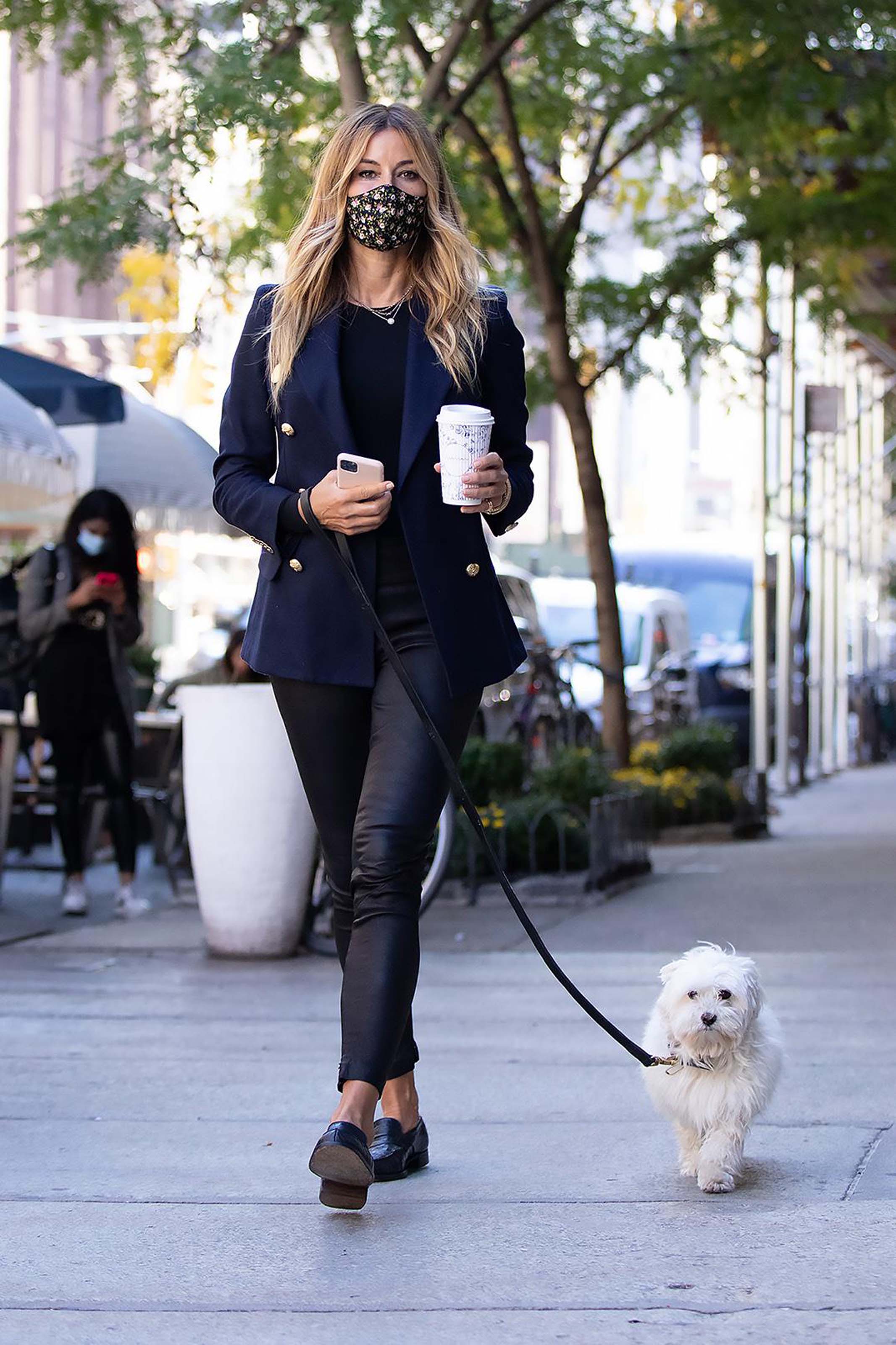 Kelly Killoren Bensimon walking her dog in New York