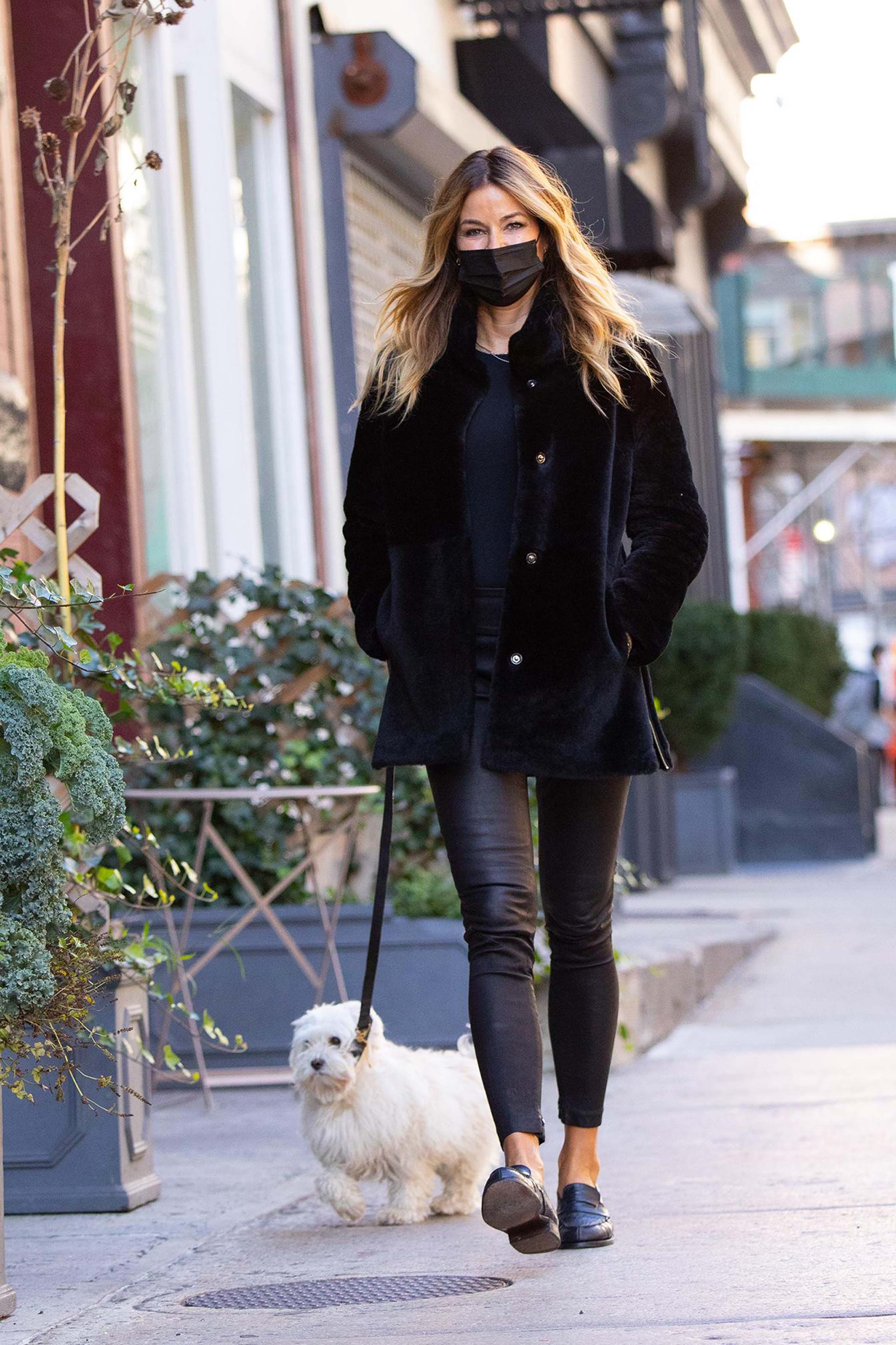 Kelly Killoren Bensimon walking her dog in New York