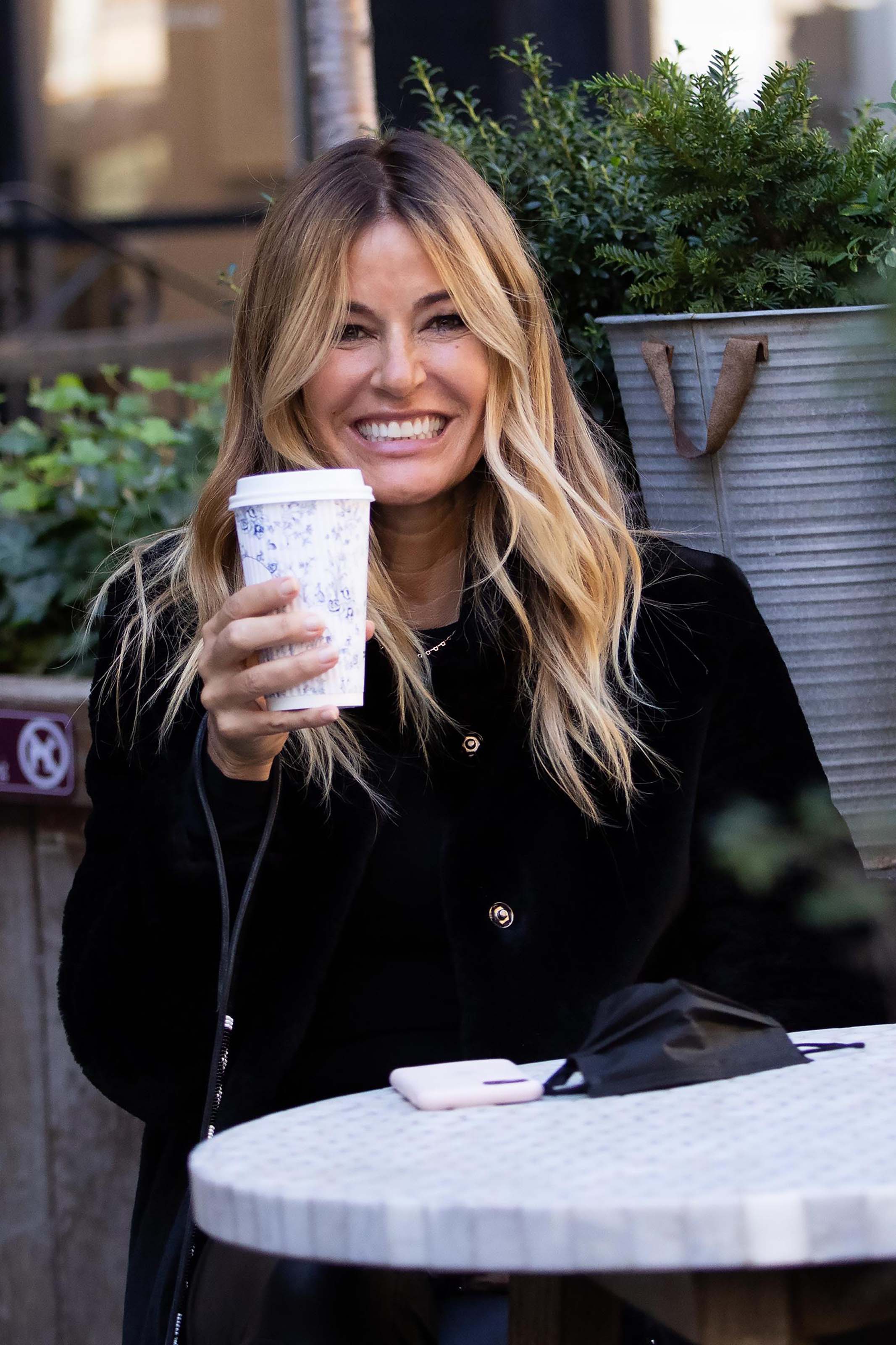 Kelly Killoren Bensimon walking her dog in New York