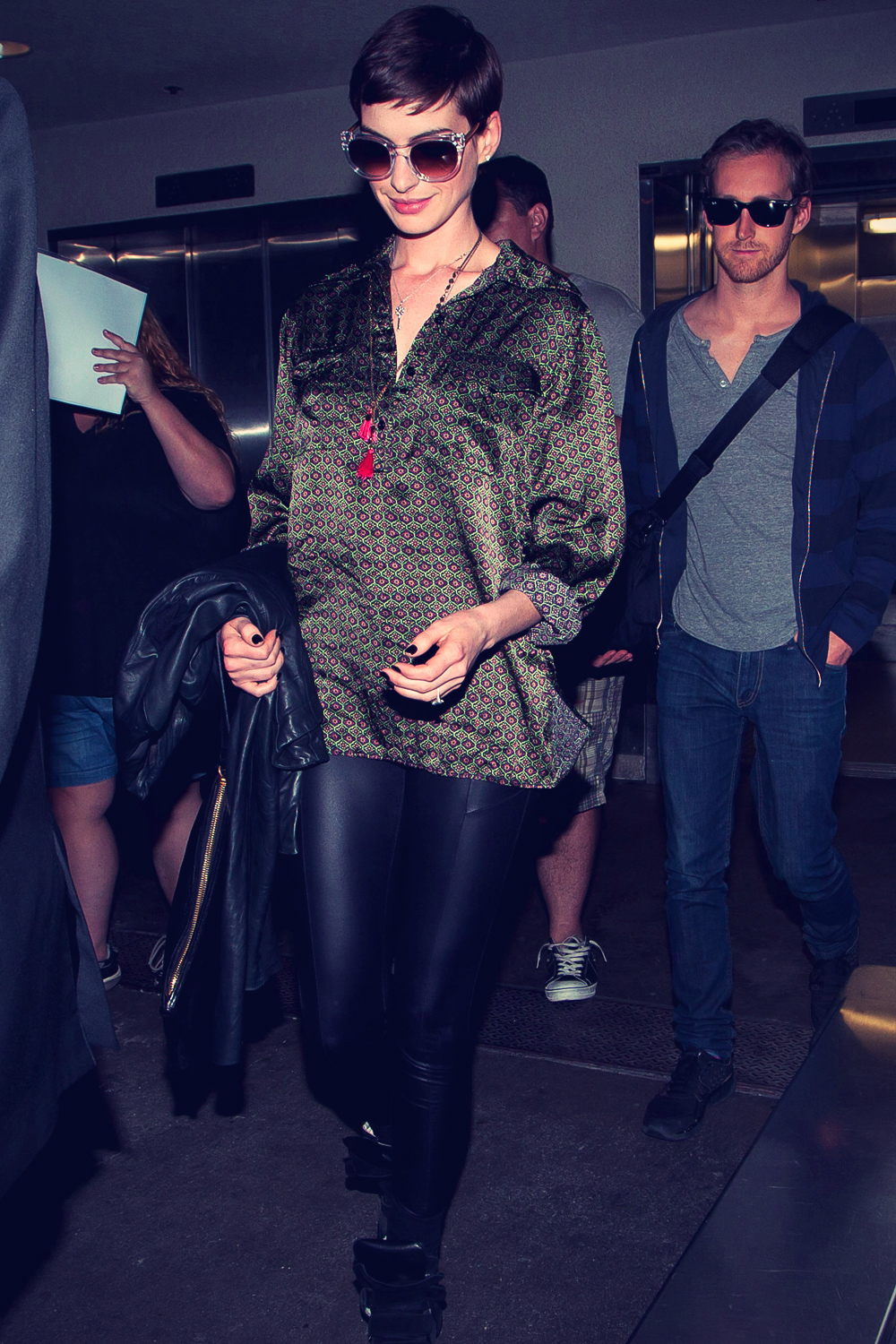 Anne Hathaway arrive at LAX