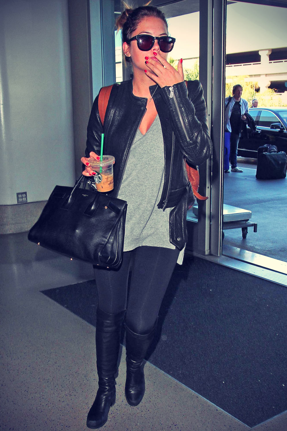 Ashley Benson making her through LAX