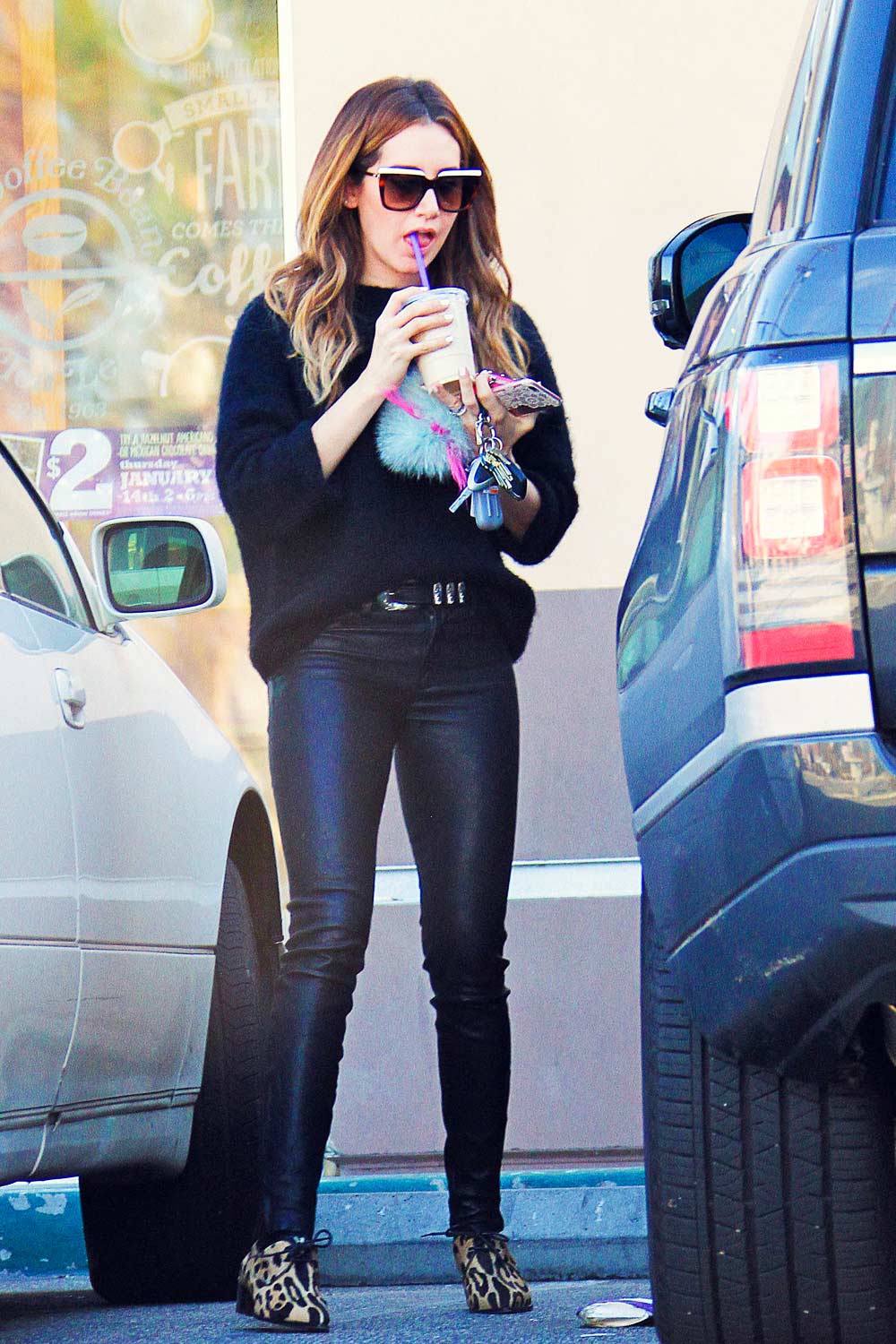 Ashley Tisdale getting some iced coffee in Studio City - Leather ...