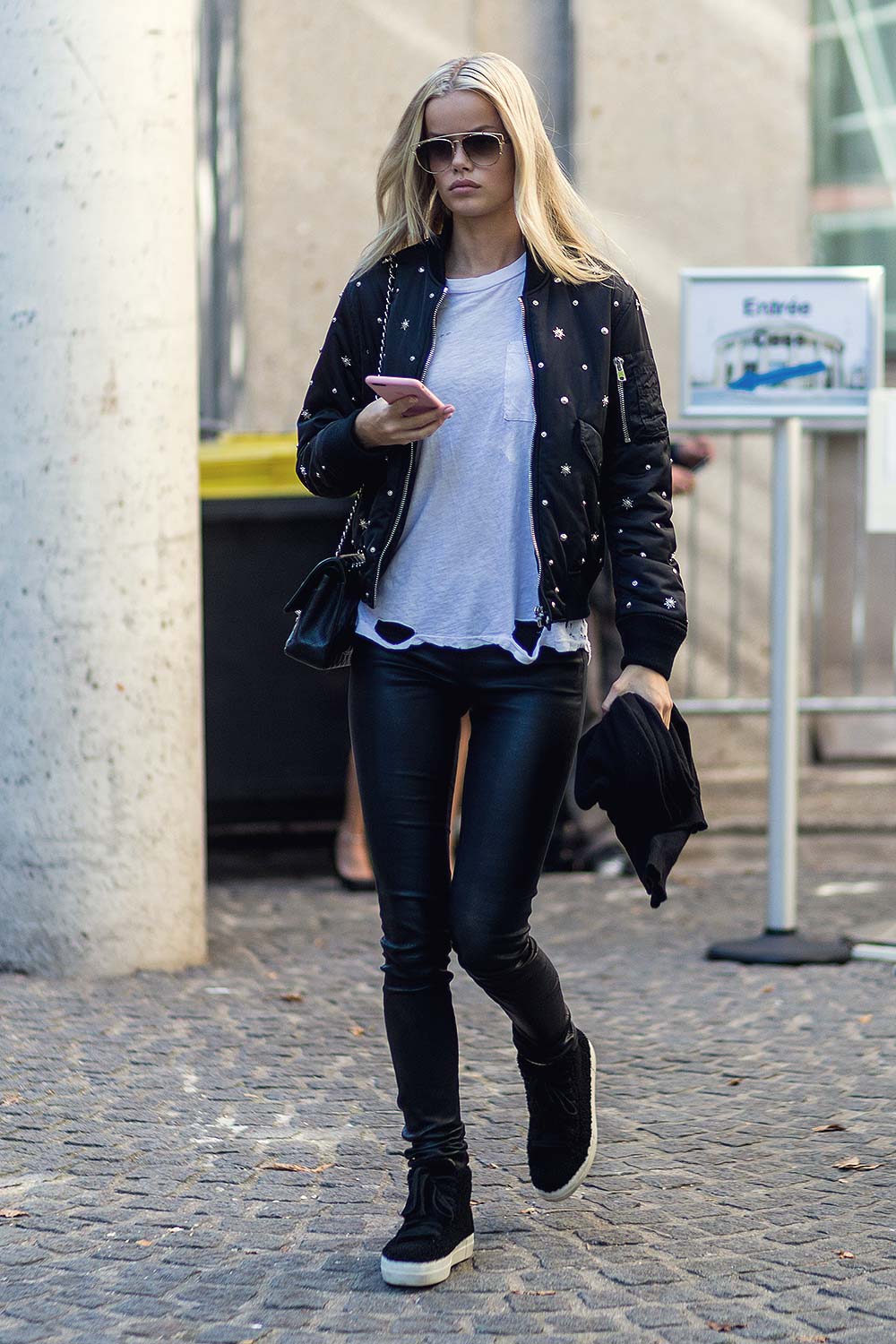 Frida Aasen outside Miu Miu on October 5, 2016 in Paris, France.