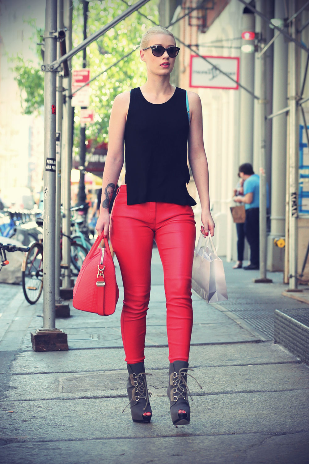 Iggy Azalea wearing red leather pants spotted shopping around at SoHo
