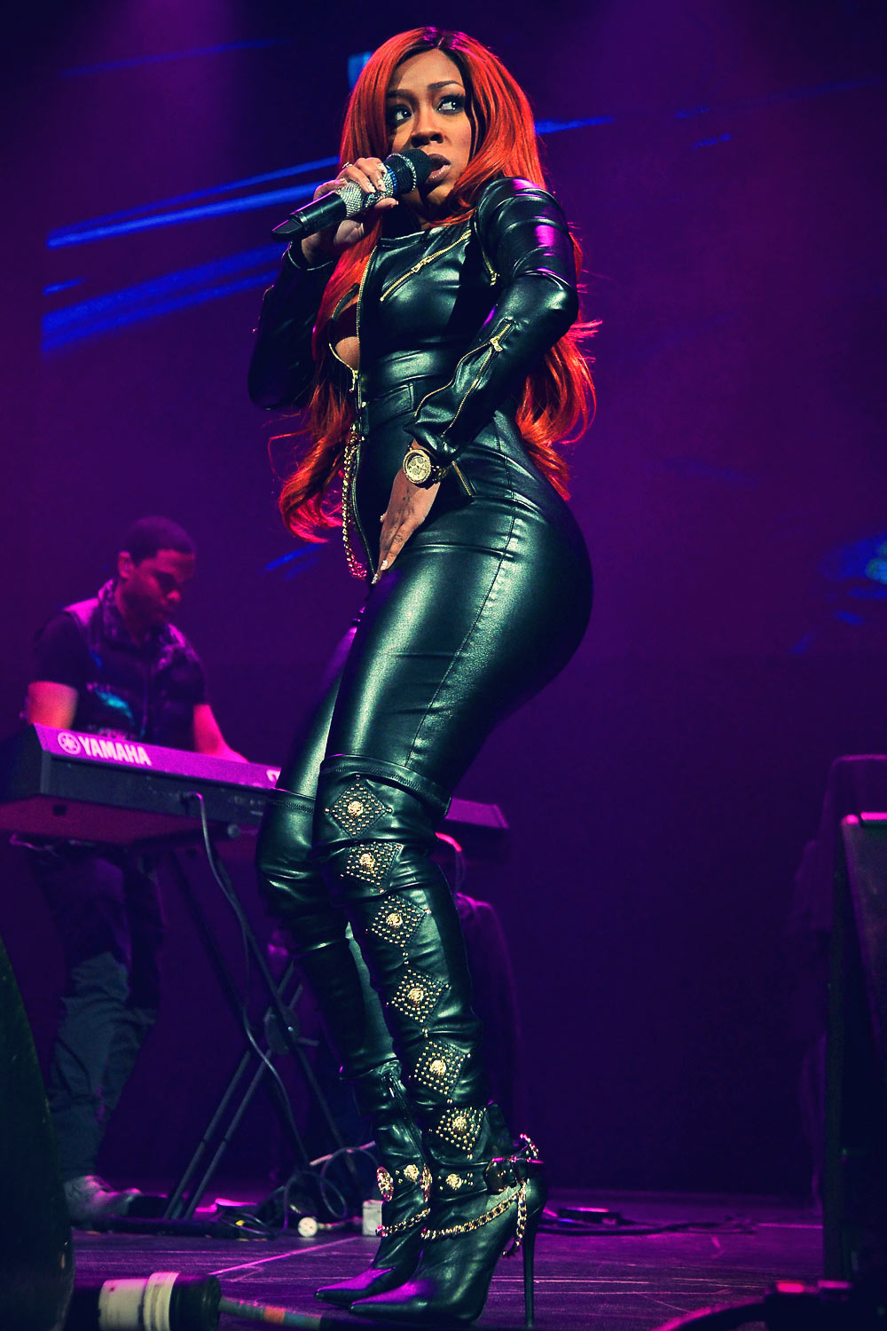 K Michelle performs in leather catsuit