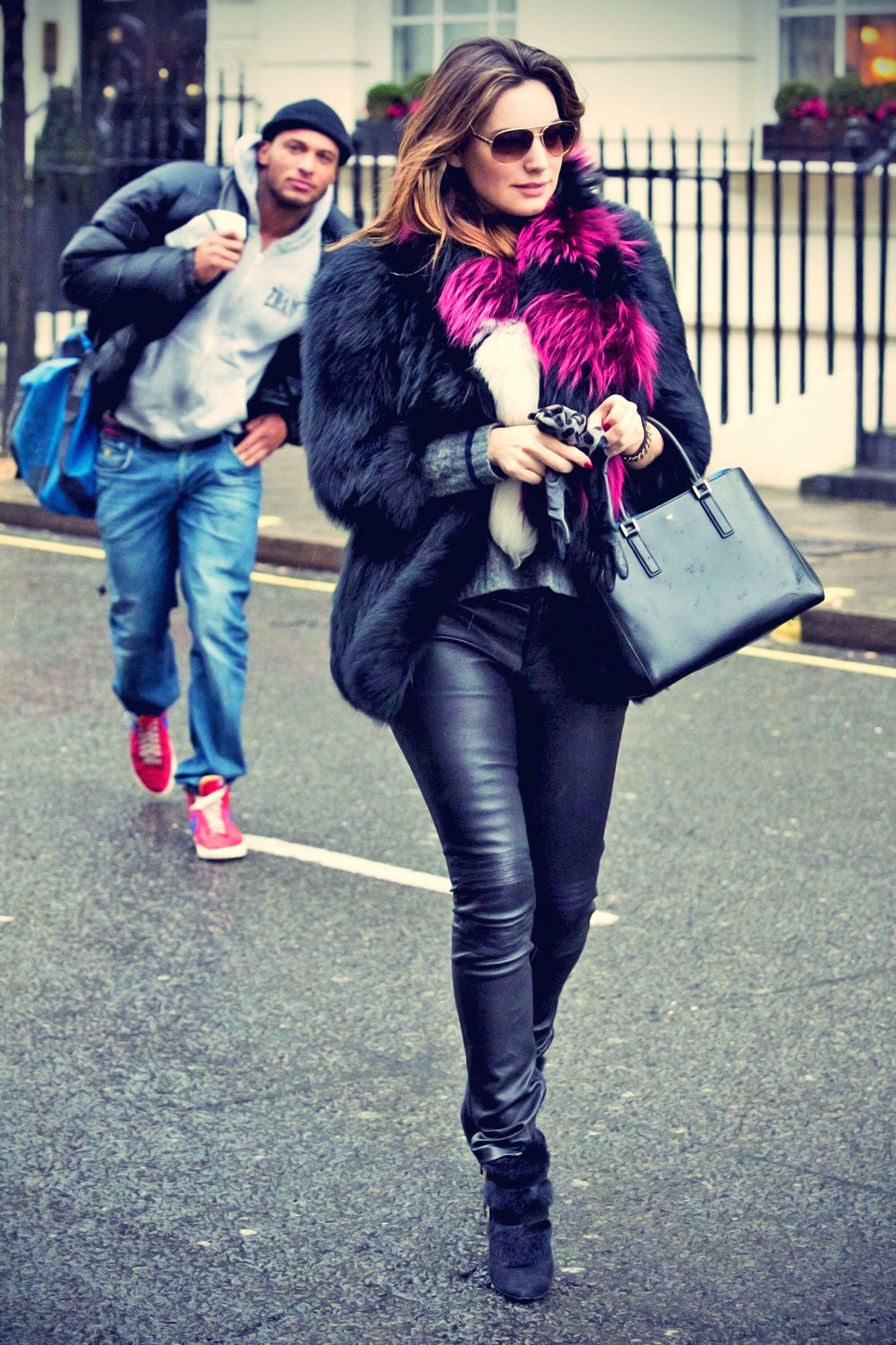 Kelly Brook leaving her London home