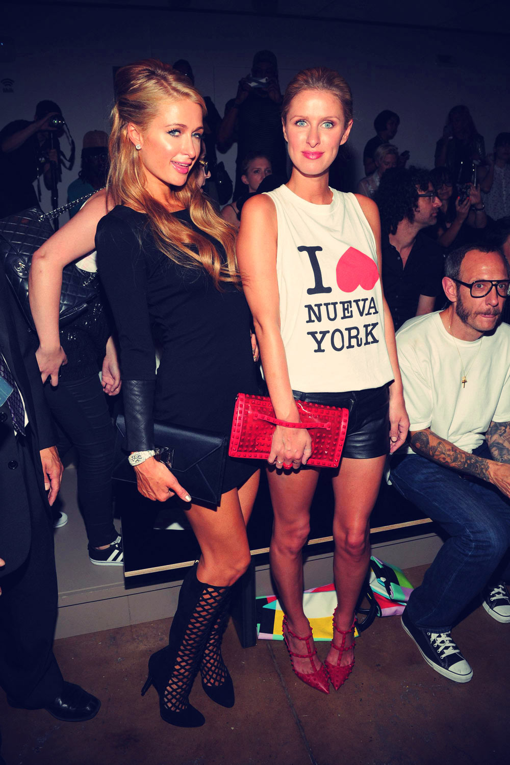 Paris & Nicky Hilton attends Jeremy Scott Show during Spring 2014