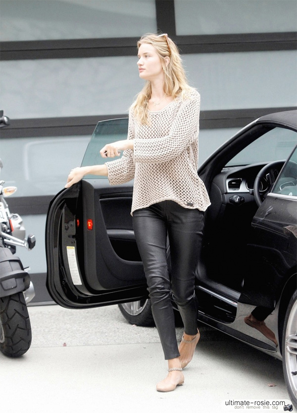 Rosie Huntington-Whitely  arriving home in her black sports car, Los Angeles