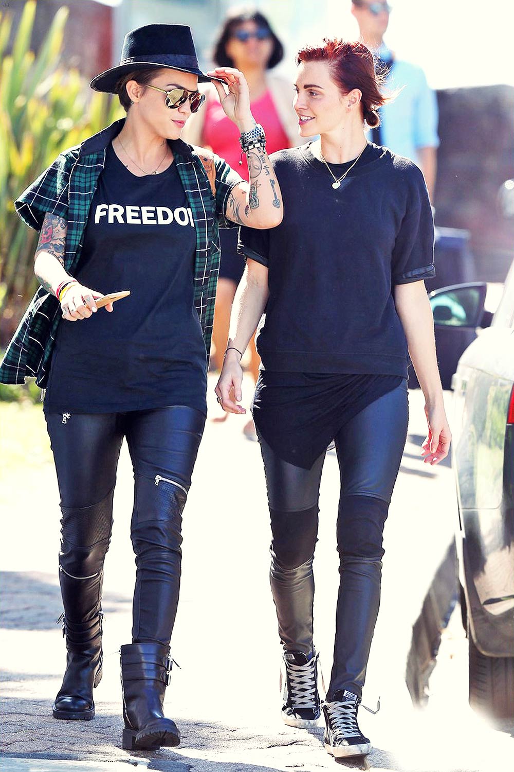 Ruby Rose and her fiancee Phoebe Dahl hold hands.