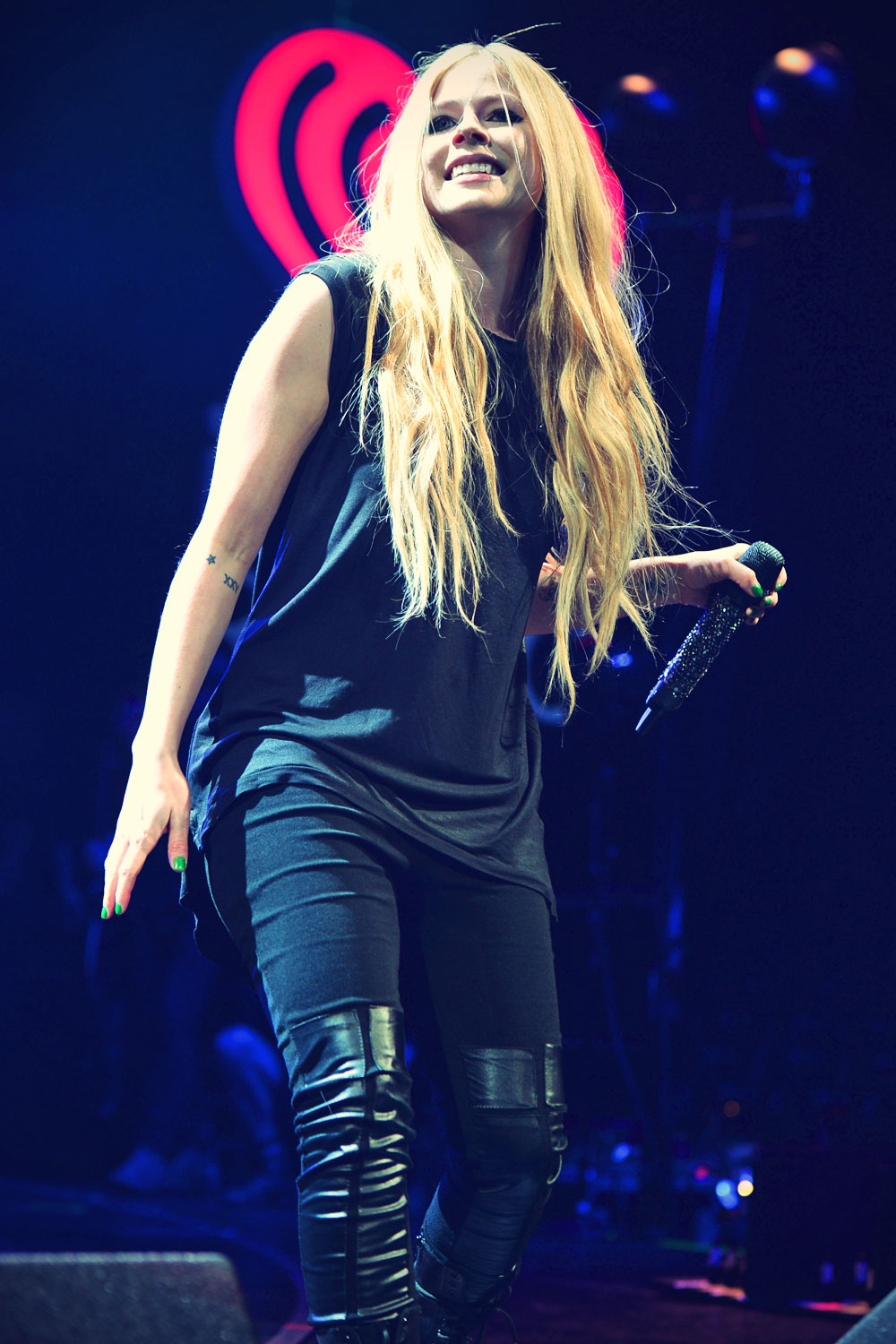 Avril Lavigne performs at Y100 Jingle Ball